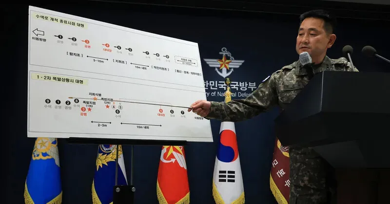 A spokesperson for the Joint Chiefs of Staff holds a briefing on the explosions of two potential land mines in the DMZ. (Yonhap)