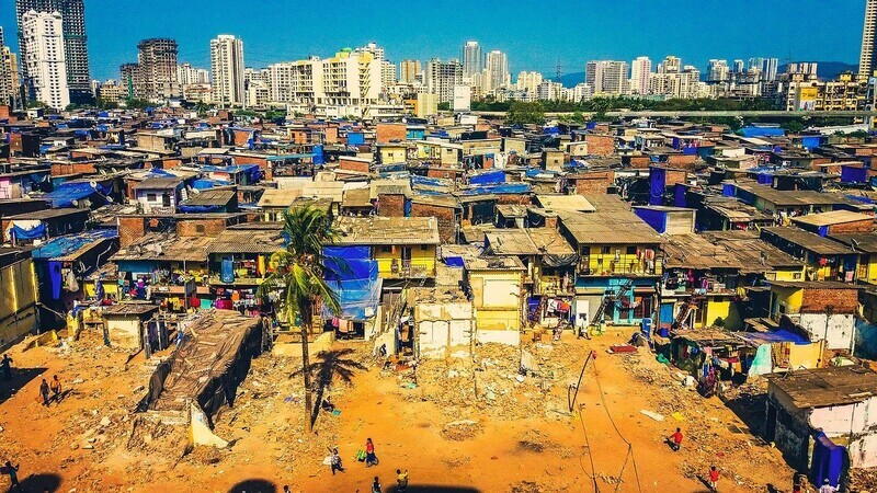 This undated photo shows the juxtaposition of modern apartments and a shantytown in Mumbai, India. (provided by Pixabay)