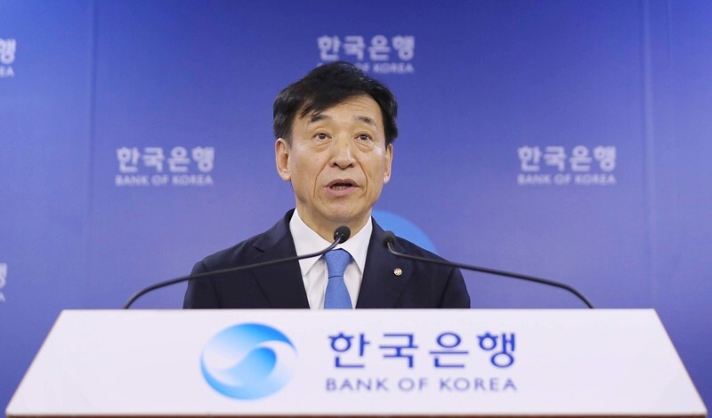 Bank of Korea (BOK) Governor Lee Ju-yeol talks to reporters about the BOK’s decision to lower interest rates in Seoul on July 18. (Baek So-ah