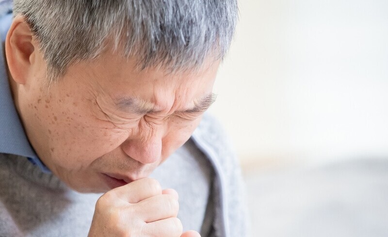 Dry cough is one of the primary symptoms of COVID-19. (Getty Images Korea)