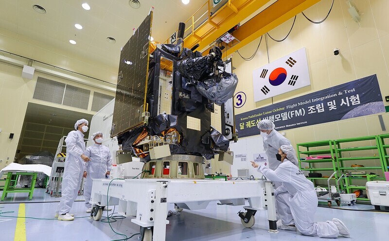 KARI researchers make final checks on the Korea pathfinder lunar orbiter Danuri before it’s moved to its launch location for launch in August 2022. (provided by KARI)