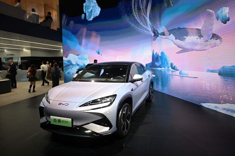 A BYD electric car on display at the Beijing Auto Show in April 2024. (AFP/Yonhap)