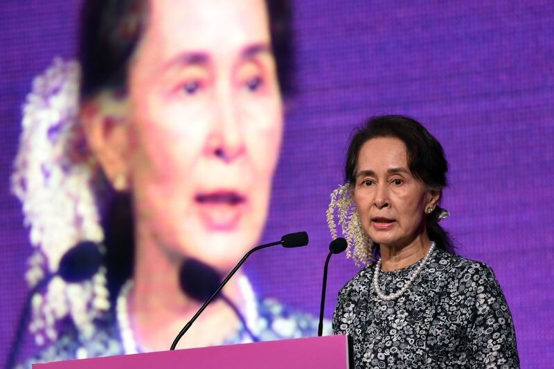 Myanmar’s state counselor and de facto leader Aung San Suu Kyi speaks at the business forum of the ASEAN Summit in Singapore on Dec. 12. (AFP)