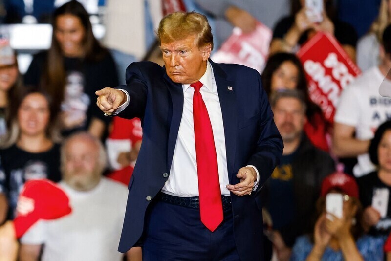 Republican presidential nominee Donald Trump points into the crowd at a campaign event in February 2024. (AFP/Yonhap)