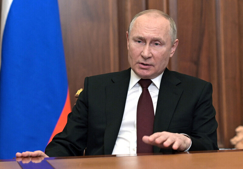 Russian President Vladimir Putin addresses the nation from the Kremlin on Feb. 21. On Feb. 27, he put the country’s nuclear forces on alert. (AFP/Yonhap News)