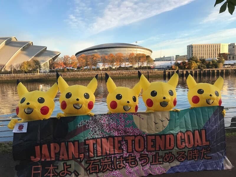 No Coal Japan, an organization opposing the use of coal in Japan, holds a protest on Thursday across from the Scottish Event Campus, where the UN climate summit COP26 is taking place. They are dressed as Pikachu, a character from a Japanese animation that emits electricity from its body. (provided by No Coal Japan)