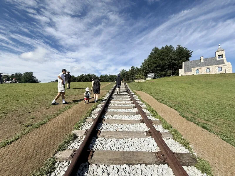 The train tracks in front of Silver Bell Church.
