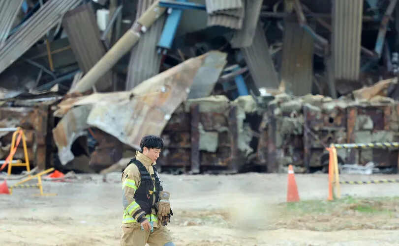 Fire rescue workers continued to search for missing workers in the rubble of the collapsed boiler tower in Ulsan throughout the day on Nov. 12, 2025. (Yonhap)