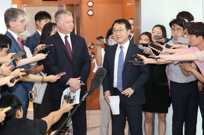 US State Department Special Representative for North Korea Stephen Biegun and South Korean Special Representative for Korean Peninsula Peace and Security Affairs Lee Do-hoon talk to reporters after their meeting at the South Korean Ministry of Foreign Affairs in Seoul on Aug. 21. (airs in Seoul on Aug. 21.