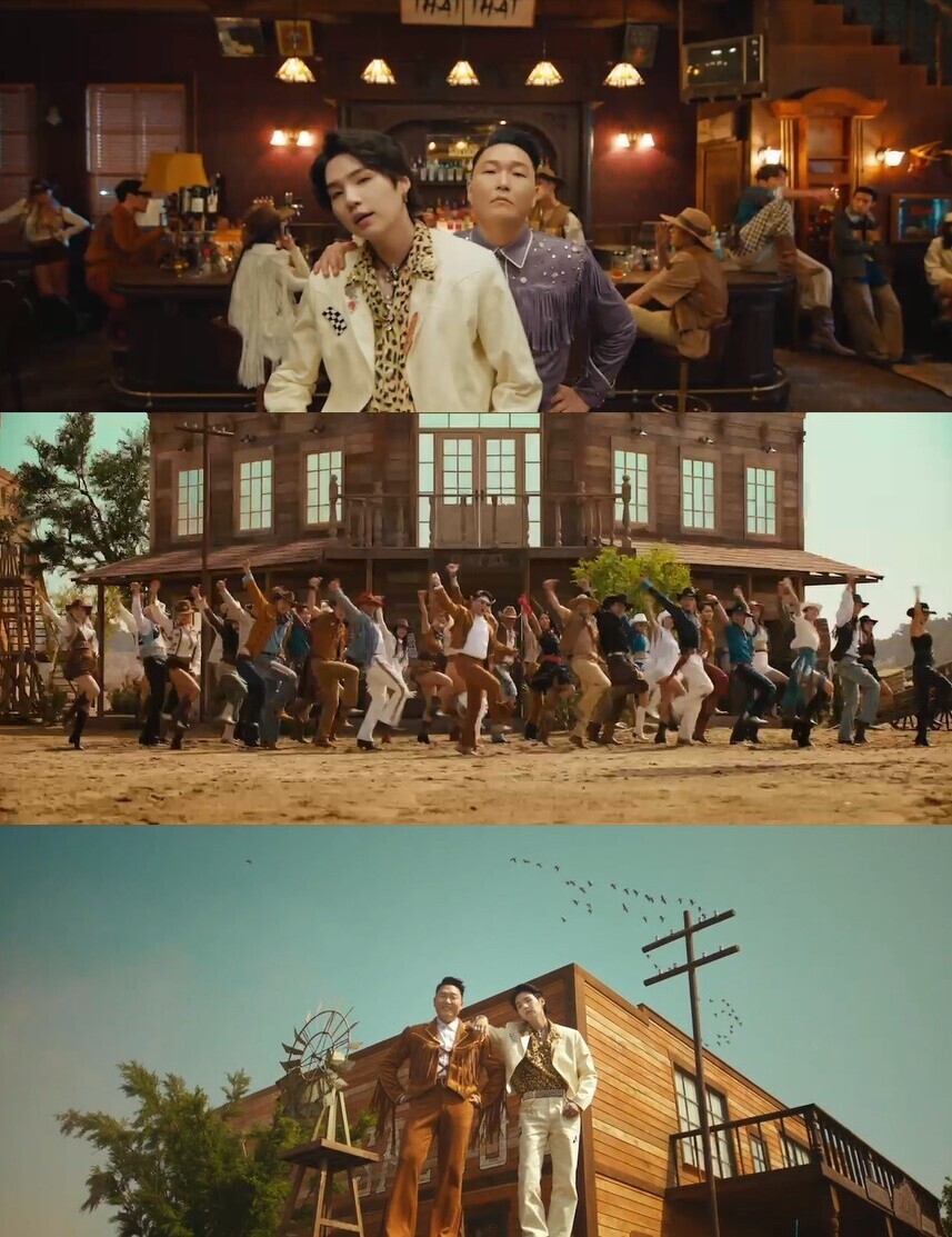 Psy appears alongside Suga from BTS in the music video for “That That.” (provided by P Nation)