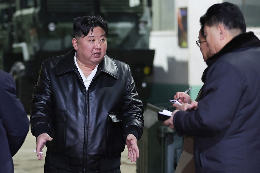 North Korean leader gives instructions while touring a munitions factory in early January 2024. (KCNA/Yonhap)