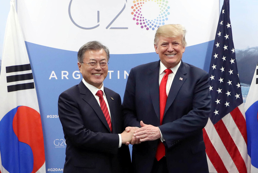 South Korean President Moon Jae-in shakes hands with US President Donald Trump during the G20 Summit in Buenos Aires