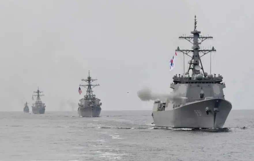 A South Korean Navy Sejong the Great-class Aegis destroyer leads a formation of ships during a maritime firing drill on Oct. 13, 2016, with the US. (via ROK Navy)