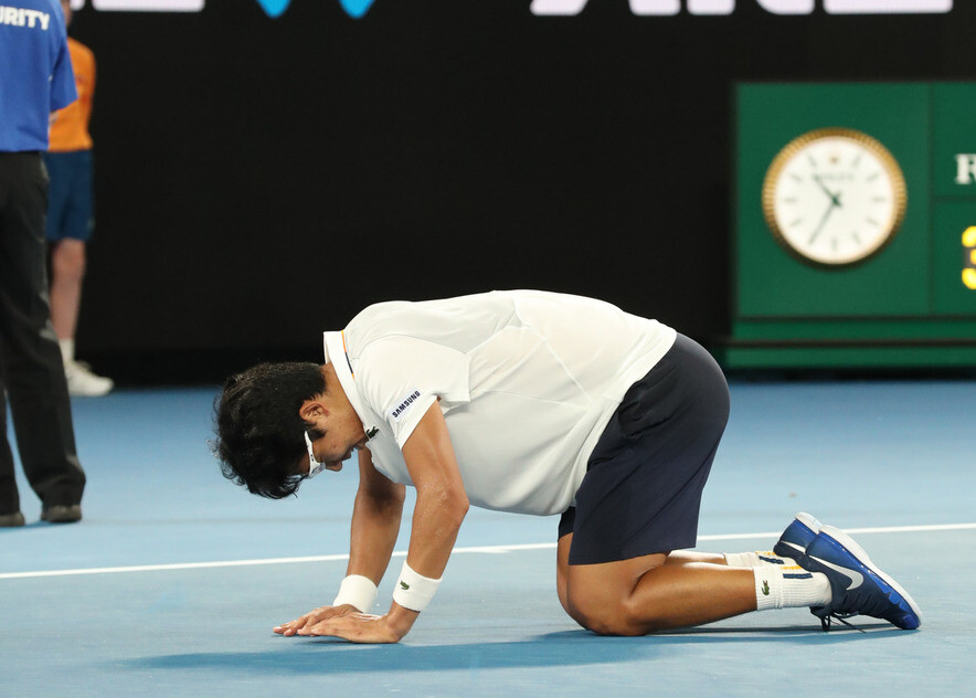 Hyeon Chung bows to his parents and his coach after his fourth-round Australian Open match