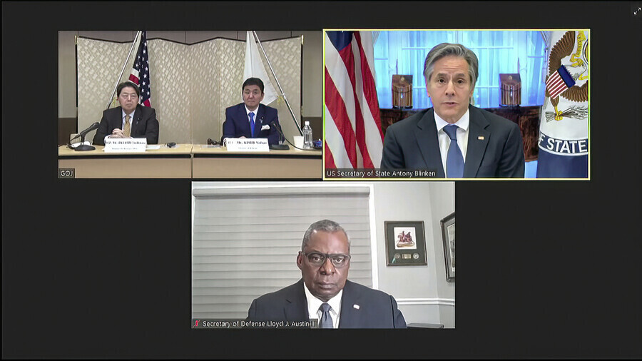 This still from a virtual Security Consultative Committee (2+2) meeting on Friday morning, shows (from left to right, top to bottom) Japanese Foreign Minister Yoshimasa Hayashi and Japanese Defense Minister Nobuo Kishi, US Secretary of State Antony Blinken, and US Defense Secretary Lloyd Austin. (AP/Yonhap News)