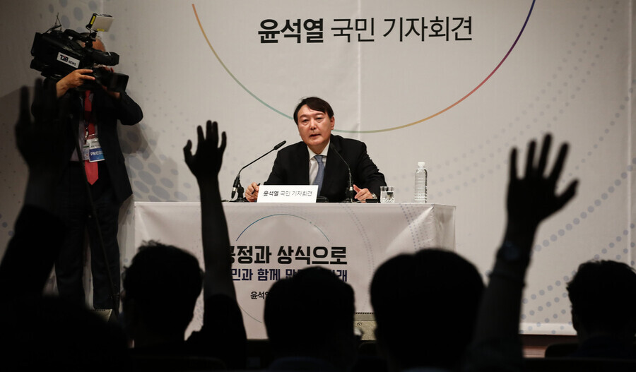 Former Prosecutor General Yoon Seok-youl takes questions from reporters during a press conference Tuesday at the Yun Bong-gil Memorial Hall in Seoul. (National Assembly press photographers)