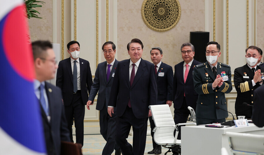 President Yoon Suk-yeol arrives for a briefing from the Ministry of Foreign Affairs and Ministry of National Defense at the Blue House on Jan. 11. (courtesy of the presidential office)