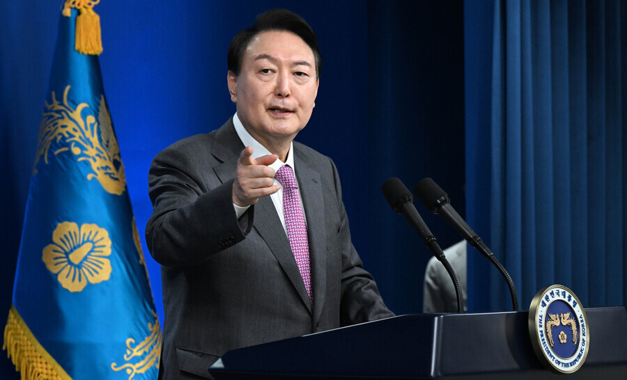 President Yoon Suk-yeol answers a question from the press during a news conference held at the presidential office in Yongsan to mark his 100th day in office on Aug. 17. (presidential office pool photo)