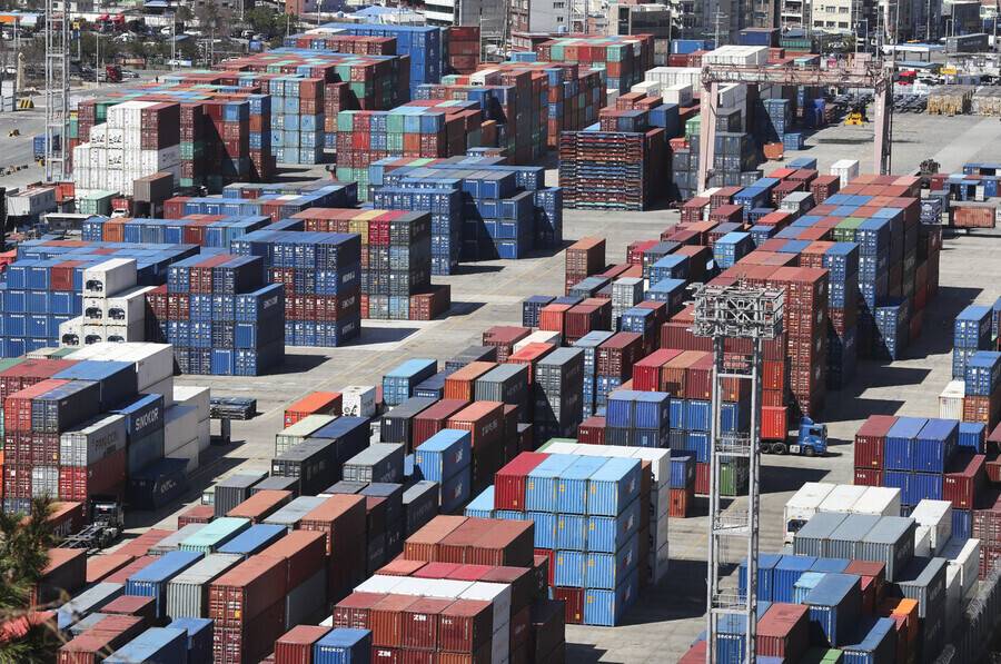 Freight containers fill a port yard in Busan, South Korea. (Yonhap)