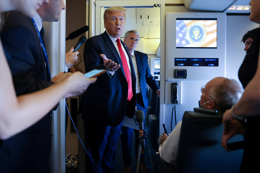 US President Donald Trump addresses reporters on a flight from Cape Canaveral, Florida, to Washington, DC, on May 30. (Yonhap News)
