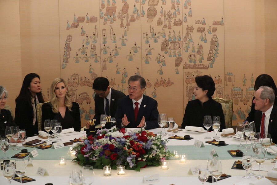 President Moon Jae-in and his wife Kim Jung-sook talk during dinner with Ivanka Trump at the Sangchunjae (Everlasting Spring) Pavilion at the Blue House on Feb. 23. President Trump was the only guest who was invited to attend a dinner at the Sangchunjae Pavilion of the Blue House with Moon and the first lady