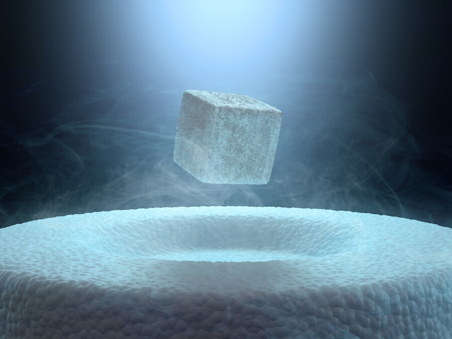A depiction of a magnet levitating above a superconductor. (Getty Images Bank)