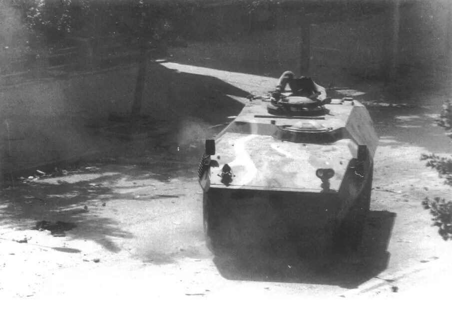 Ryu said he saw the deaths of a young man waving the Korean flag from atop an armored vehicle and a student in a military training uniform standing next to him. (May 18 Democratization Movement Truth Commission archives)