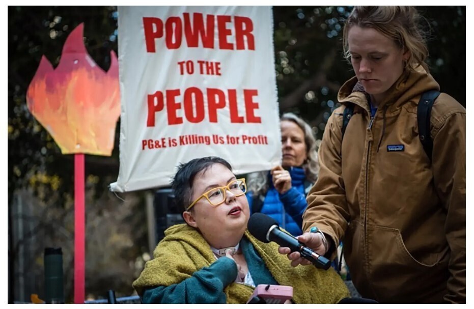Stacey Park Milbern, a Korean American disability justice activist speaks at a rally in San Francisco in2019. (New York Times)