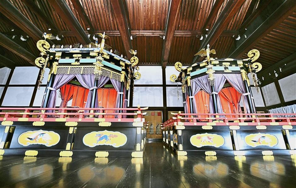 Elaborate structure: The Takamikura throne (left) and Michodai, a curtained platform, at the Imperial Palace in Kyoto, western Japan. — AP