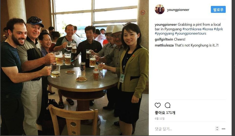 Tourists on a Young Pioneer Tour have a beer in a pub in Pyongyang (from Young Pioneer Tour Instagram)