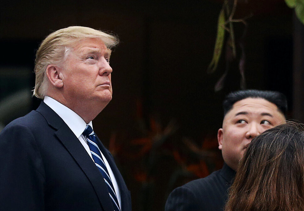 US President Donald Trump (right) and North Korean leader Kim Jong-un walk in the garden of the Sofitel Legend Metropole hotel in Hanoi after their summit on Feb. 28, 2019. (Yonhap News)