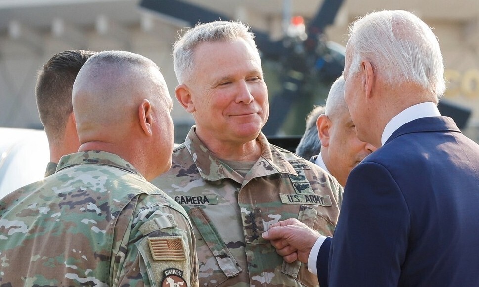 Gen. Paul LaCamera, the commander of the US Forces Korea, greets US President Joe Biden during the latter’s visit to Korea on May 22, 2022. (Yonhap)