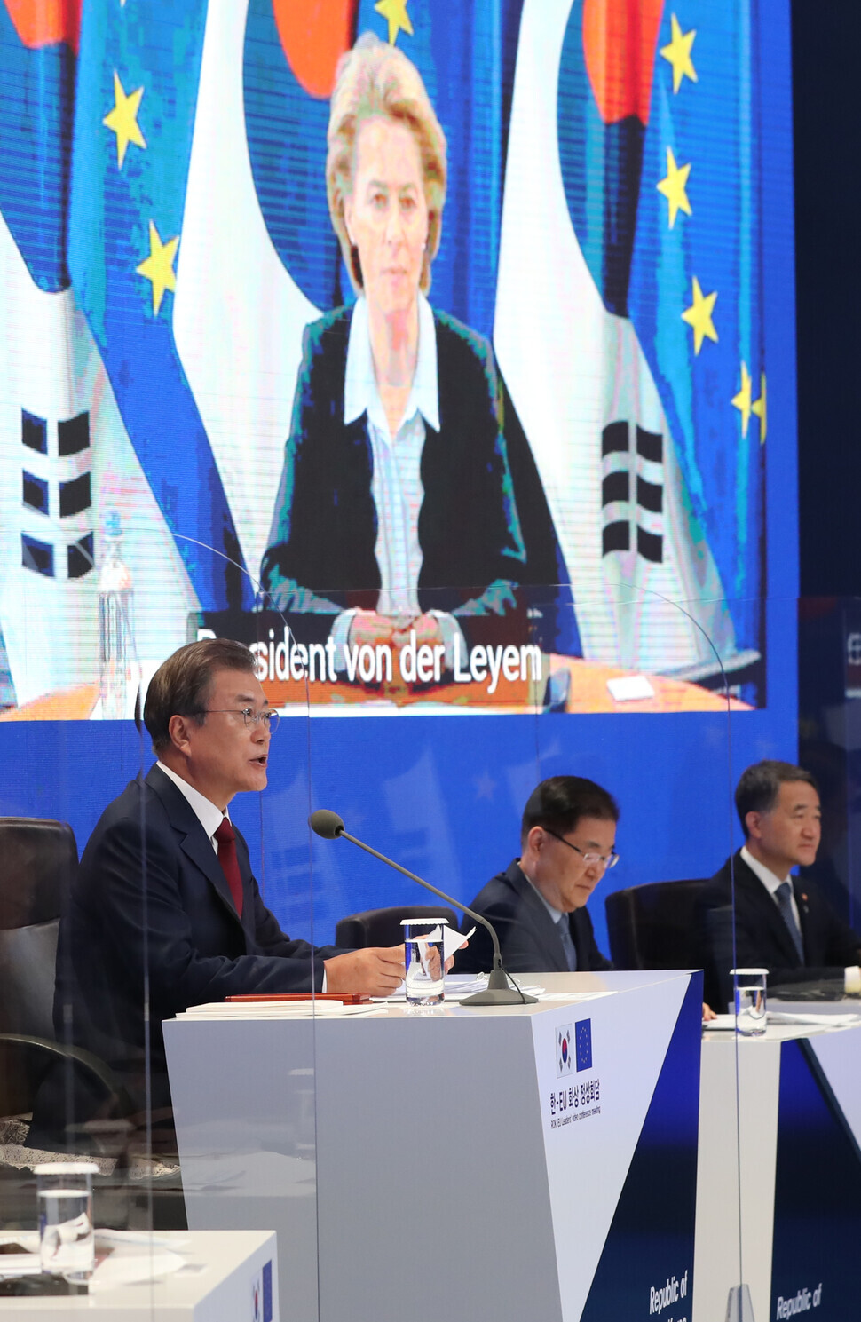 South Korean President Moon Jae-in holds a virtual summit with Charles Michel, president of the European Council, and Ursula von der Leyen, president of the European Commission, at the Blue House on June 30.