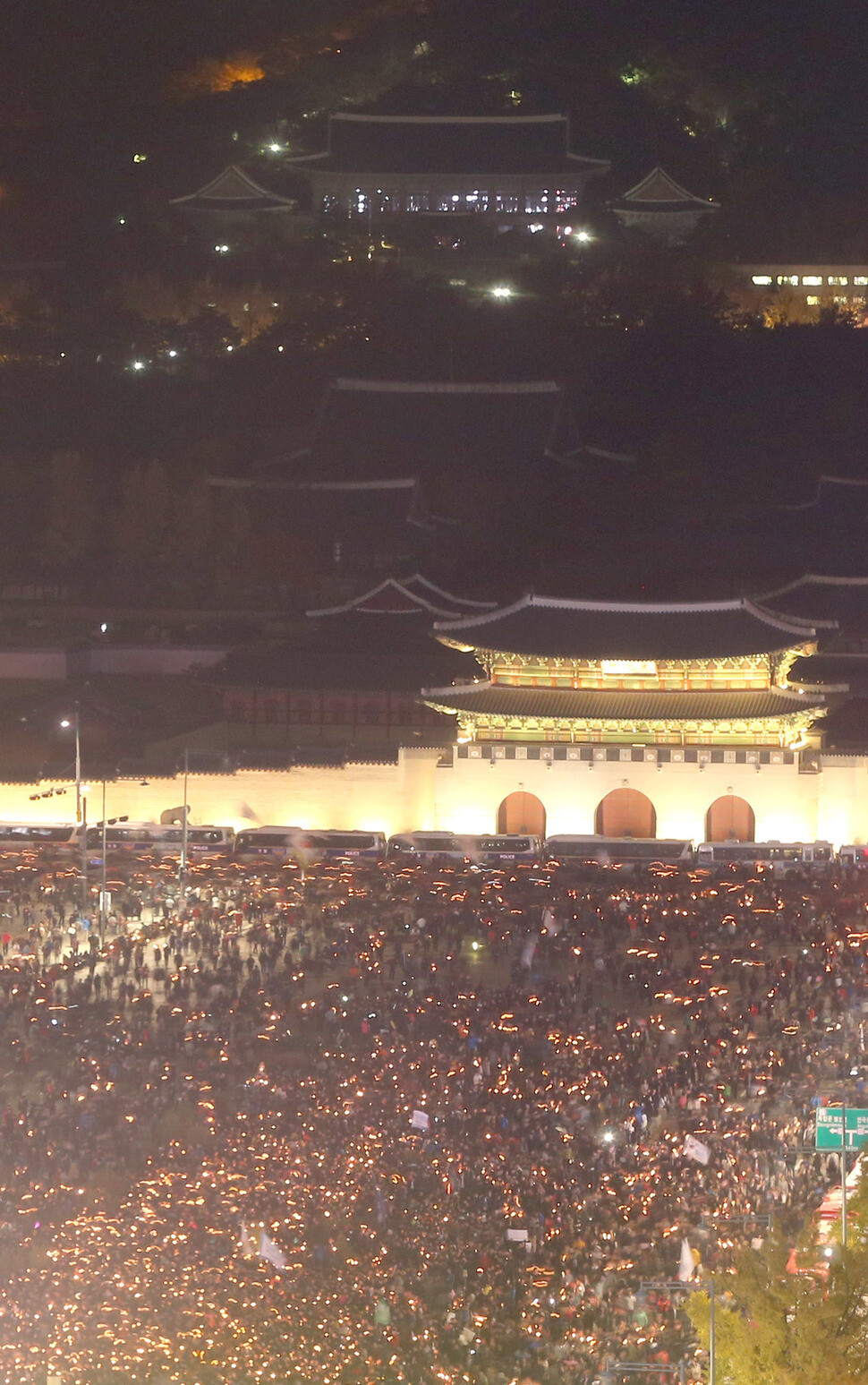 The Blue House seen behind Gwanghwamun Gate during the third weekly candlelight demonstration in central Seoul