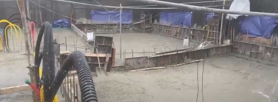 A still from a video of the apartment building in Gwangju minutes before the collapse of its outer wall.