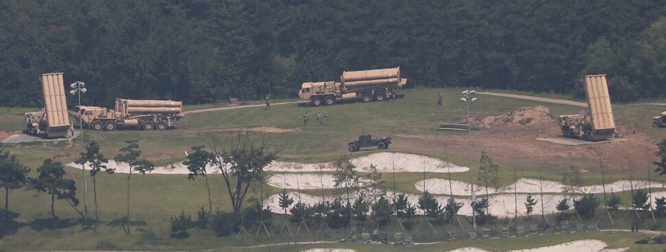 USFK vehicles containing equipment for the THAAD missile defense system await orders for installation at the base in Seongju County