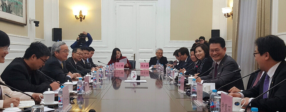  discussing the deployment of the THAAD missile defense system with experts