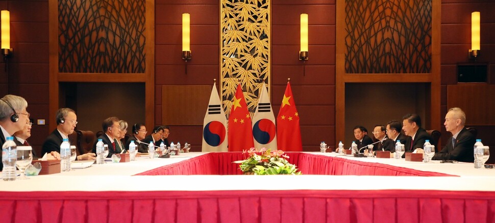 South Korean President Moon Jae-in holds a summit with Chinese President Xi Jinping at the Crown Plaza Hotel in Da Nang