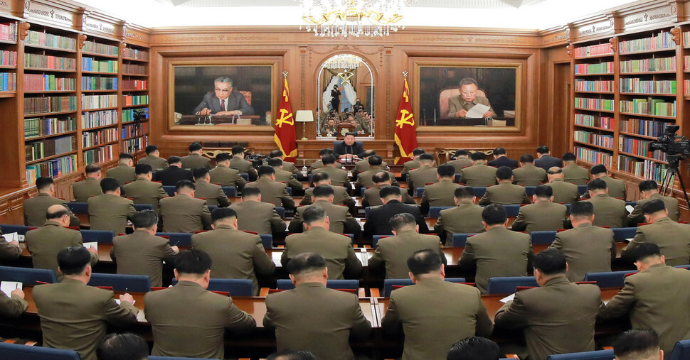 An image of North Korean leader Kim Jong-un presiding over an expanded meeting of the Workers’ Party of Korea Central Military Commission in Pyongyang released by the Korean Central News Agency on Dec. 22. (Yonhap News)