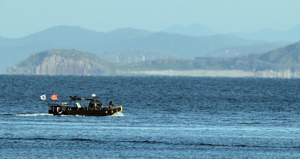 On Sept. 27, South Korean marines conduct a search operation in the waters off Yeonpyeong Island for the remains of a Ministry of Oceans and Fisheries official who was shot and killed by North Korean military. (Yonhap News)