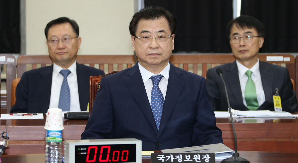 National Intelligence Service Director Suh Hoon prepares for a hearing of the National Assembly Intelligence Committee on July 11. (pool photo)