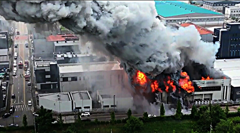 A fire blazes at a lithium battery factory in South Korea’s Hwaseong, a city in Gyeonggi Province, on June 24, 2024. The fire killed over 20, mostly foreign, workers. (Yonhap)