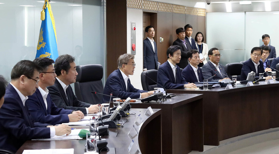 President Moon Jae-in (fourth from the left) presides over his first National Security Council meeting