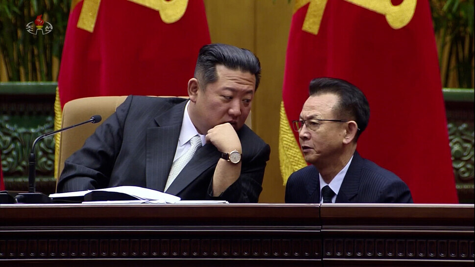 North Korean leader Kim Jong-un speaks to O Il-jong, who oversees military affairs for the WPK Central Committee, during the 2nd Conference of Secretaries of the Primary Committees of North Korea's Workers' Party, held between Feb. 26 and Feb. 28. (still from Korean Central Television/Yonhap News)