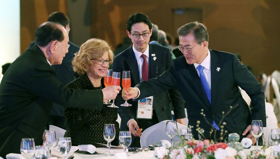 South Korean President Moon Jae-in shares a toast with North Korean Supreme People’s Council Presidium president Kim Yong-nam during a reception at the Blisshill Stay at Yongpyong Resort in Pyeongchang County