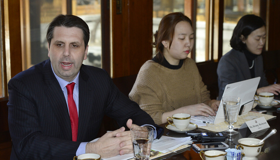 US Ambassador Mark Lippert responds to questions from reporters covering the Ministry of Foreign Affairs during an interview at his residence in Seoul