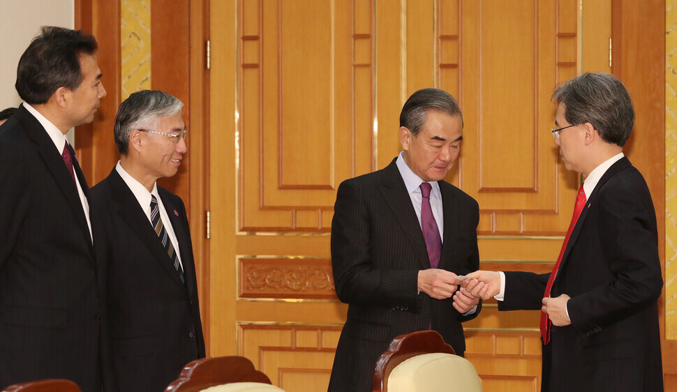 Kim Hyun-chong, second deputy director of the National Security Office, meets with Chinese Foreign Minister Wang Yi at the Blue House in December 2019. (Yonhap News)