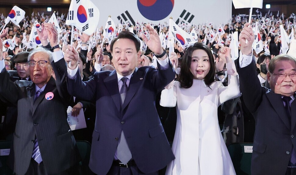 President Yoon Suk-yeol and first lady Kim Keon-hee take part in an event commemorating the March 1 Independence Movement at the Yu Gwan-sun Memorial Hall in downtown Seoul on March 1. (Yonhap)