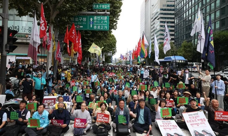 Citizens march in central Seoul against the proposed troop deployment to the Strait of Hormuz