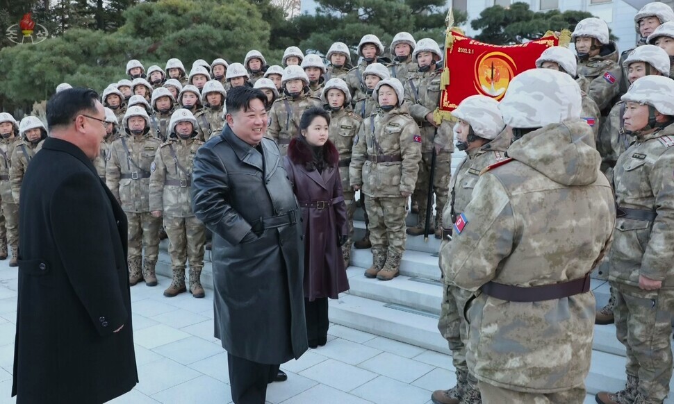 The Pyongyang state-run KCNA reported on Dec. 21 that North Korean leader Kim Jong-un had met and congratulated members of the 2nd Red Flag Company under the General Missile Bureau on Dec. 20 on the launch of the Hwasong-18 ICBM on Dec. 18. (KCNA/Yonhap)